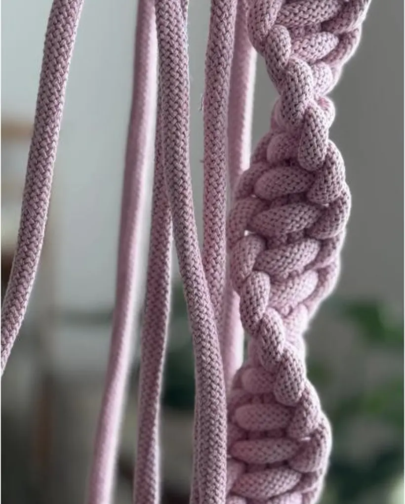 Close-up of soft pink and mauve 3mm cotton macrame cord hanging in the Bohemia Handmade studio